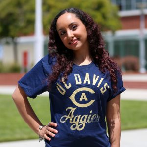 Malaka Al Hayawa poses for a head shot in Richmond's City Center Plaza